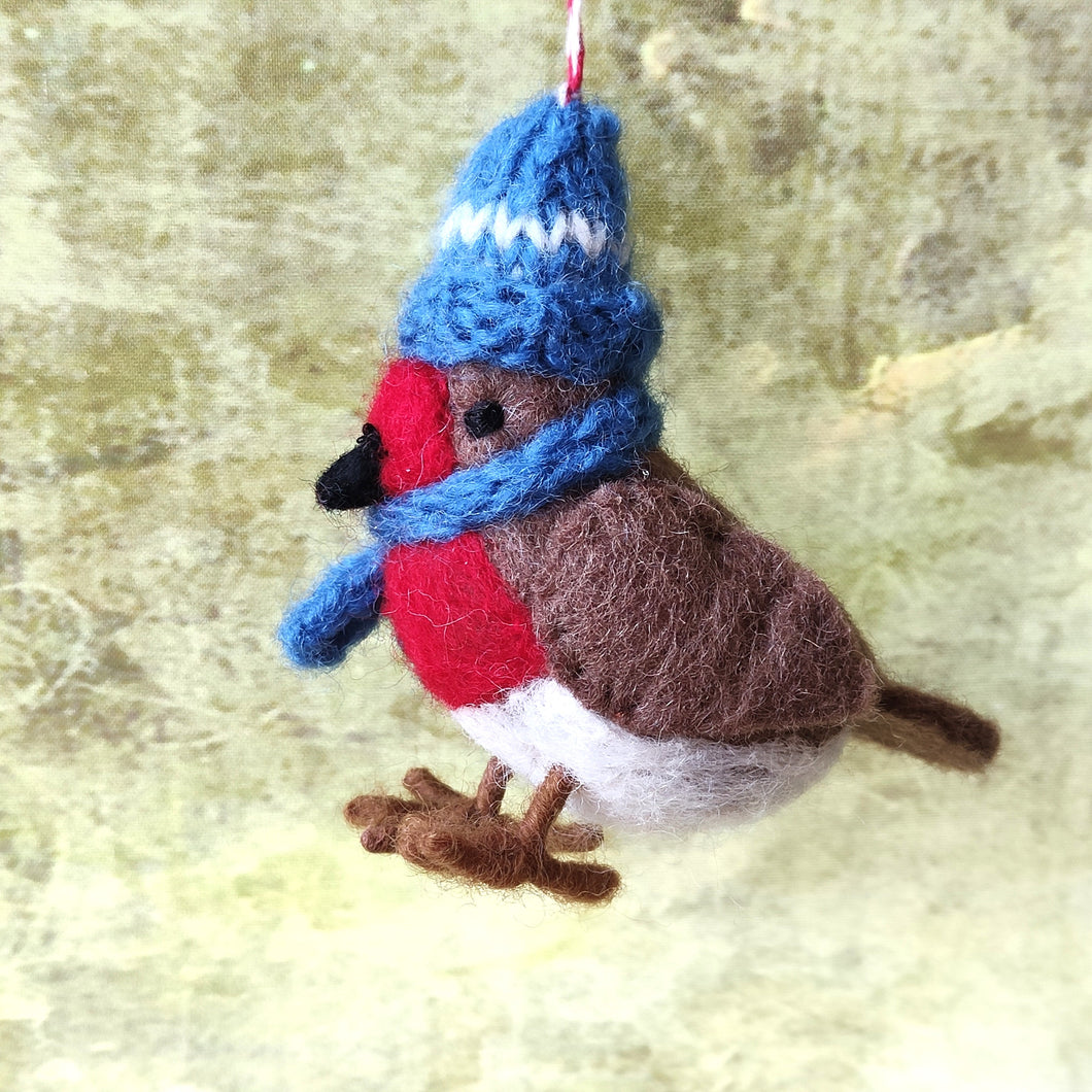 Felt Robin Christmas tree decoration with blue bobble hat and scarf. Fair Trade. Hand made in Nepal for Namaste