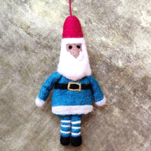 Blue felt Santa with striped stockings Christmas tree decoration hand made in Nepal under Fair Trade conditions for Namaste.