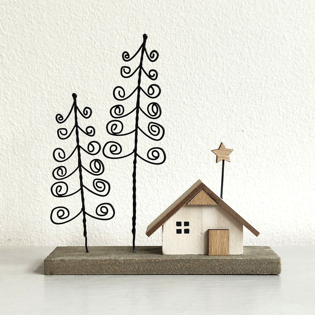 Wooden Christmas House with Spiral Trees by Heaven Sends