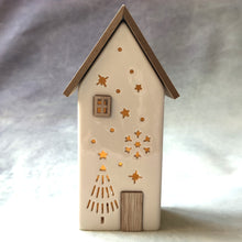 Tall ceramic festive Christmas house with LED lights from Gainsborough Giftware