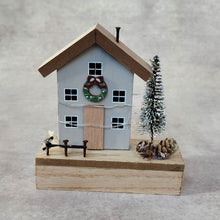 Wooden Light Up Christmas House by Heaven Sends