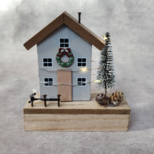 Wooden Light Up Christmas House by Heaven Sends