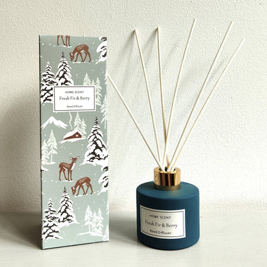 Fir & Berry home scent diffuser with packaging featuring winter-themed design on a light background by Heaven Sends